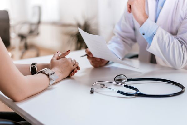 Woman consulting a qualified healthcare professional